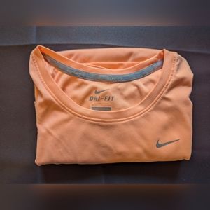 Light orange Nike Dri-fit shirt